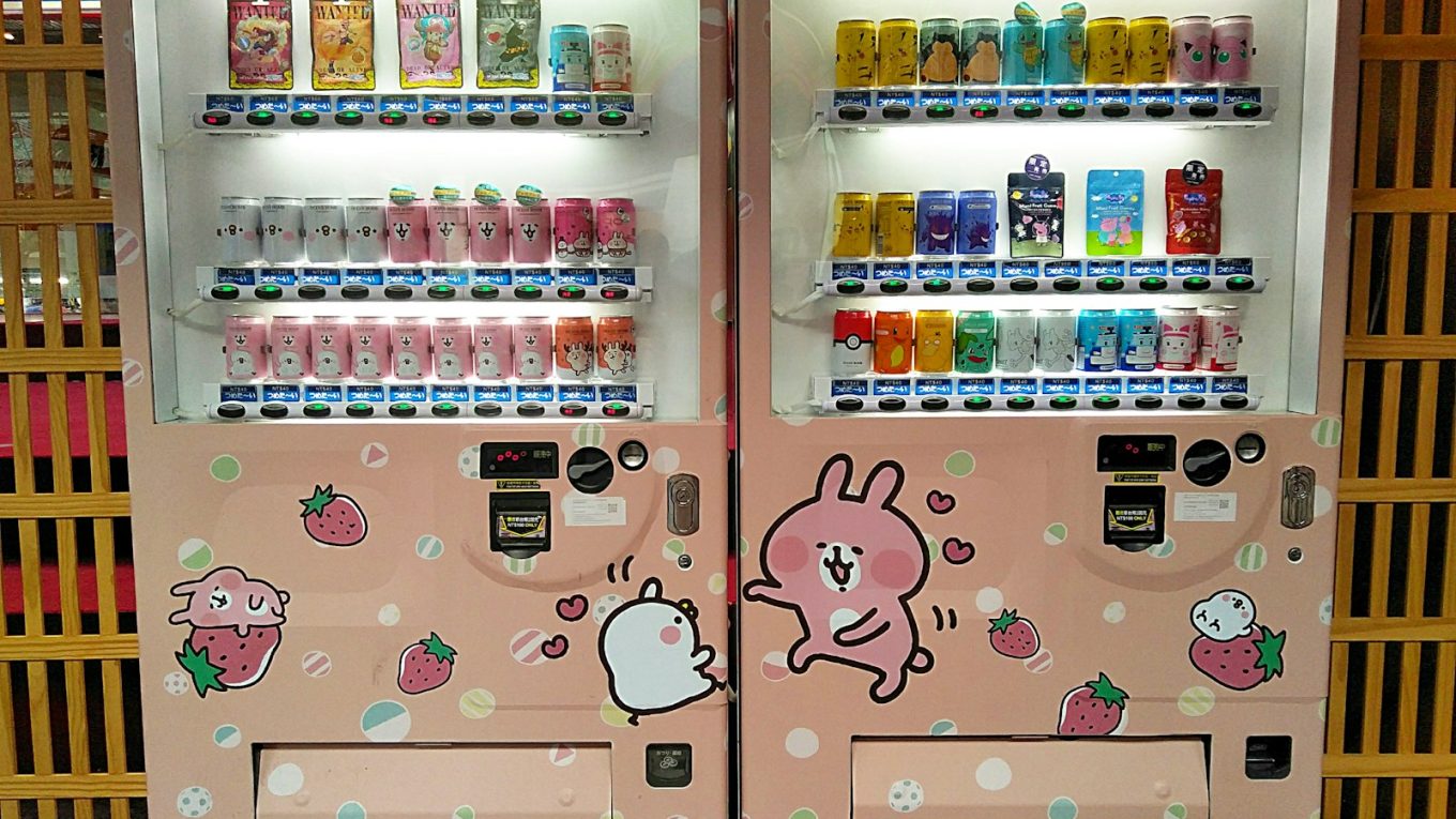 pink and white beverage vending machine